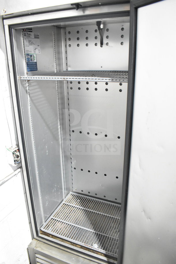 2022 True T-19F-HC commercial freezer, single door, 115V, 1 phase, interior shelves, energy-efficient design.