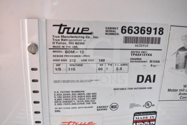 True GDM-12 Cooler Merchandiser label showing model, 115V, 1 phase, 60Hz, 5.0 F.L. amps. Serial 6636918. Made in USA.