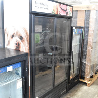 2021 True TVM-48SL-HC commercial 2-door cooler merchandiser, 115V, 1 phase, glass doors, black frame, excellent condition.