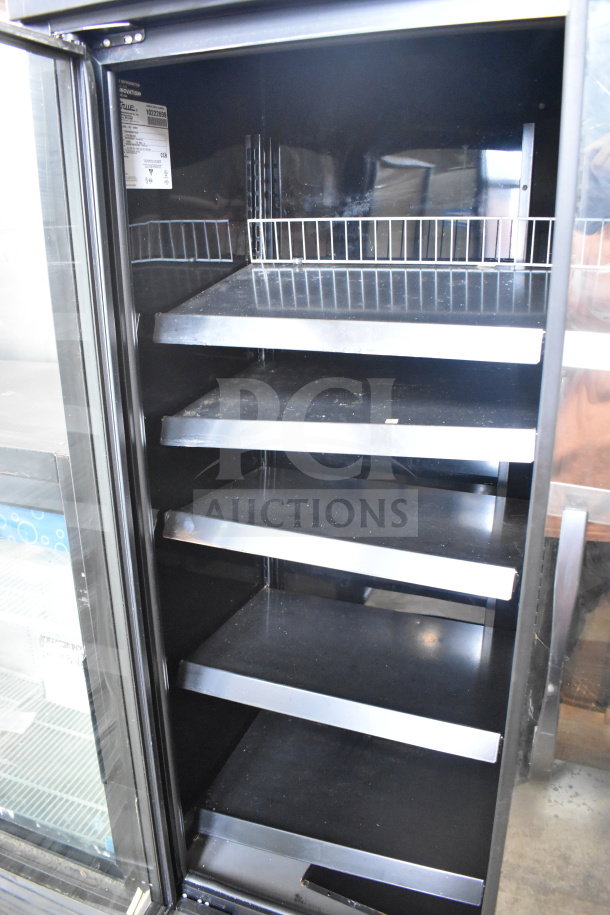 2021 True TVM-48SL-HC commercial 2-door reach-in cooler, black interior, shelving, 115 volts, 1 phase, excellent condition.
