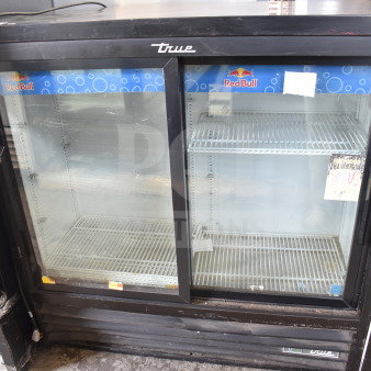 2019 True GDM-41SL-48-HC-LD commercial cooler, 2 glass doors, 115V, Red Bull branding, used condition.