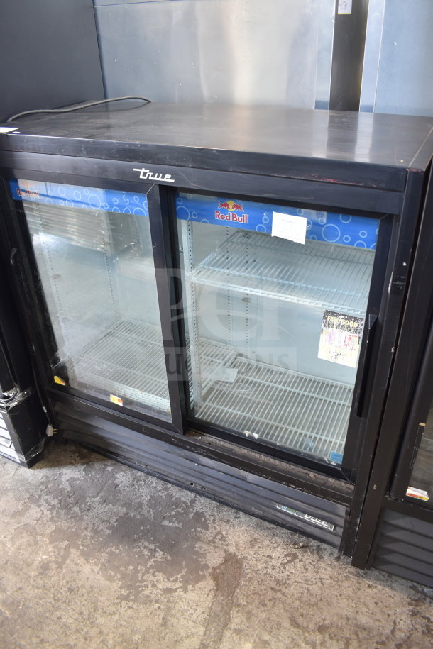 2019 True GDM-41SL-48-HC-LD 2 Door Cooler Merchandiser, black with glass doors, features visible branding and shelving.