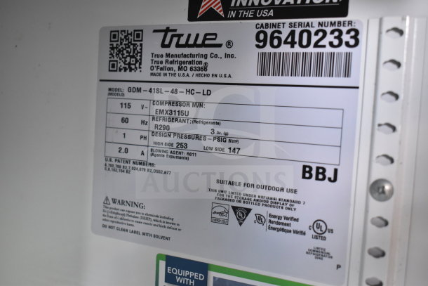 2019 True GDM-41SL-48-HC-LD commercial cooler tag showing model, serial number, voltage, and refrigerant info.
