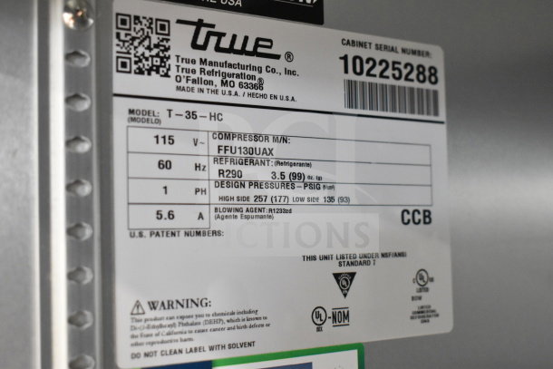 2022 True T-35-HC Commercial 2 Door Reach In Cooler label detailing model, voltage, refrigerant type, and serial number.