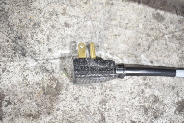 Close-up of a power plug for a 2018 True T-35-HC Commercial 2 Door Reach In Cooler, 115 Volts, 1 Phase.