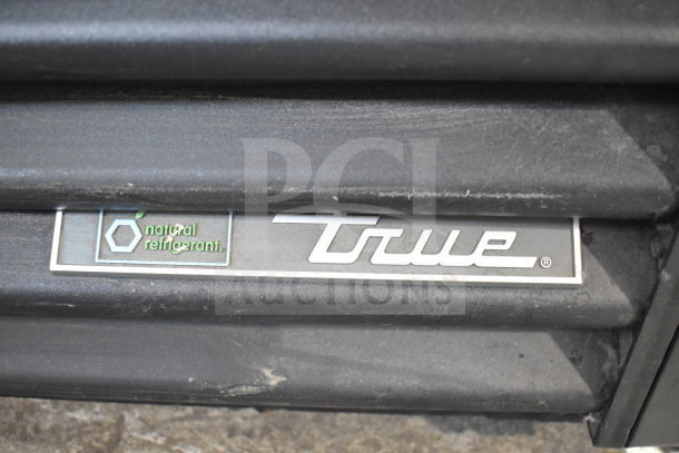 2020 True GDM-41SL-48-HC-LD cooler with "natural refrigerant" label, metal exterior, 115V, 1 phase.