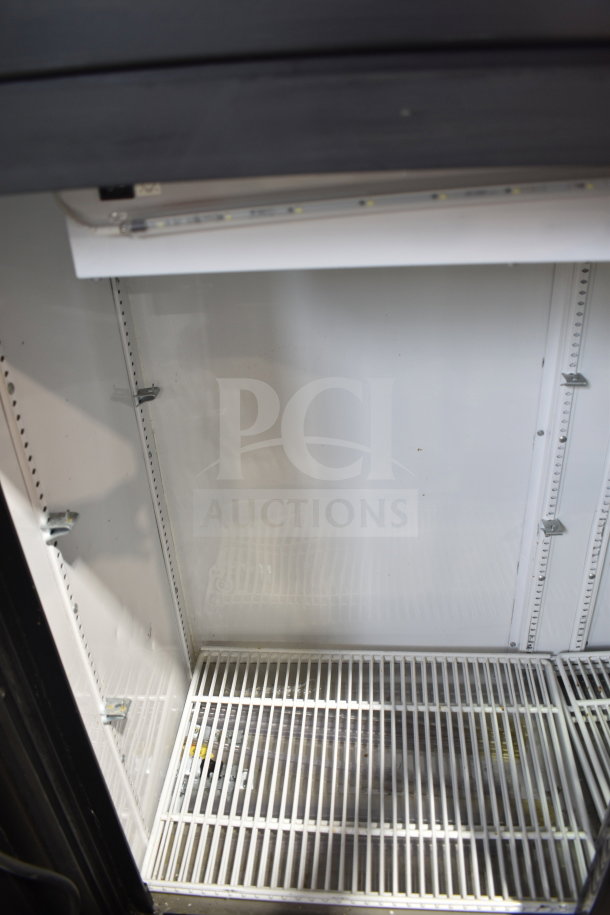 2020 True GDM-41SL-48-HC-LD cooler interior with shelving, commercial reach-in, 115V, 1-phase, clean condition.