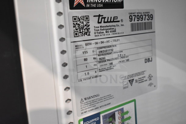 2019 True GDM-06-34-HC cooler label showing model, 115V, refrigerant R290, design pressures, and serial number.