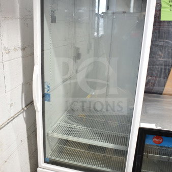 2021 True TSCI-600R-G-PH commercial single door reach-in cooler, glass door, 115 volts, 1 phase, excellent condition.
