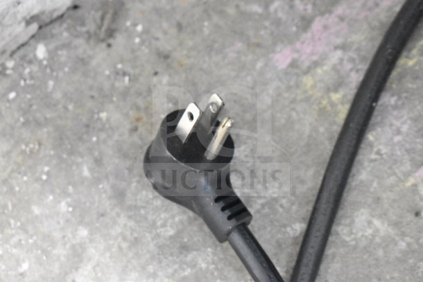 Power cord of 2021 True TSCI-600R-G-PH Commercial Cooler, 115 Volts, 1 Phase, shown against grey background.