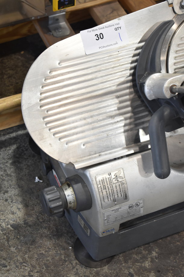 Hobart 2912 Commercial Meat Slicer, 120V, 1 Phase, shows slicer controls, labels, metal tray in used condition.