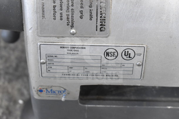 Hobart 2912 Commercial Meat Slicer label, 120 volts, 1 phase. NSF/UL certified, serial no. 561220738, made in USA.
