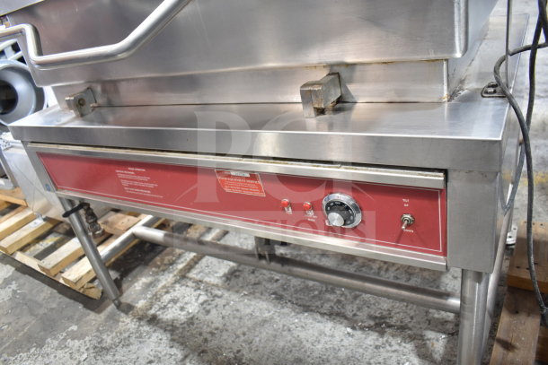 Commercial floor-style braising pan in stainless steel with red control panel, featuring temperature dial and tilt switch.