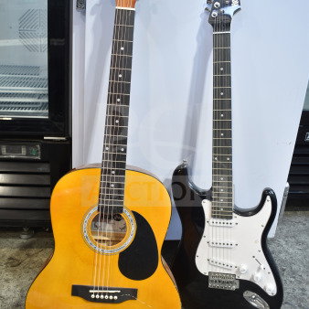 Two Rock Jam guitars, one acoustic with a natural finish and one black electric, both in good condition.