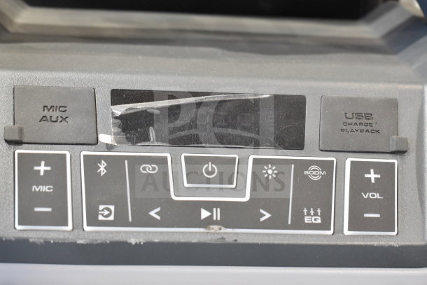 Ion Party Boom Plus Speaker control panel with buttons for mic, aux, USB, power, Bluetooth, volume, and EQ.