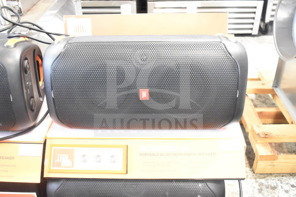 JBL PartyBox 110 Portable Bluetooth speaker on store display; includes dynamic light show, powerful sound, and splashproof design.
