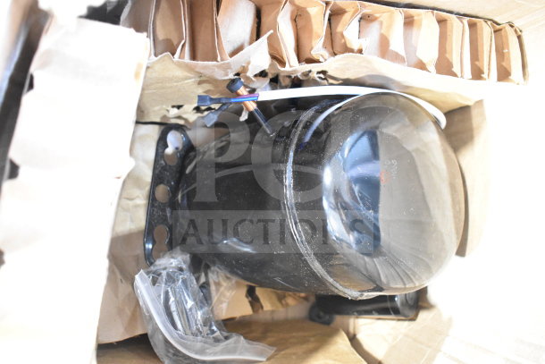 Cubigel NPY12LR motor, black, 115-127 volts, 1 phase, new condition in packaging, wires and connectors visible.