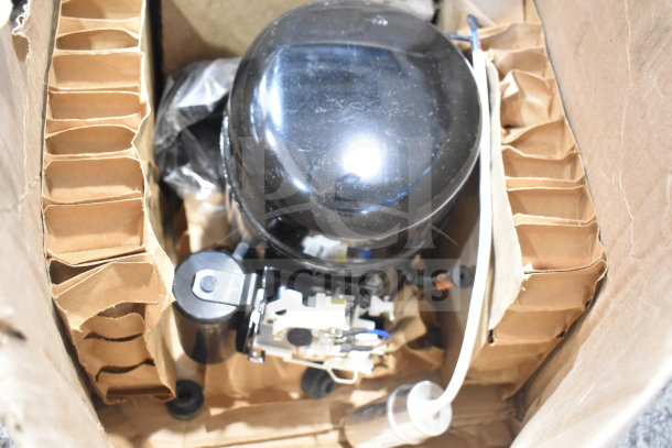 Cubigel NPY12LR motor in box, 115-127 volts, 1 phase. New condition with visible wiring and components.