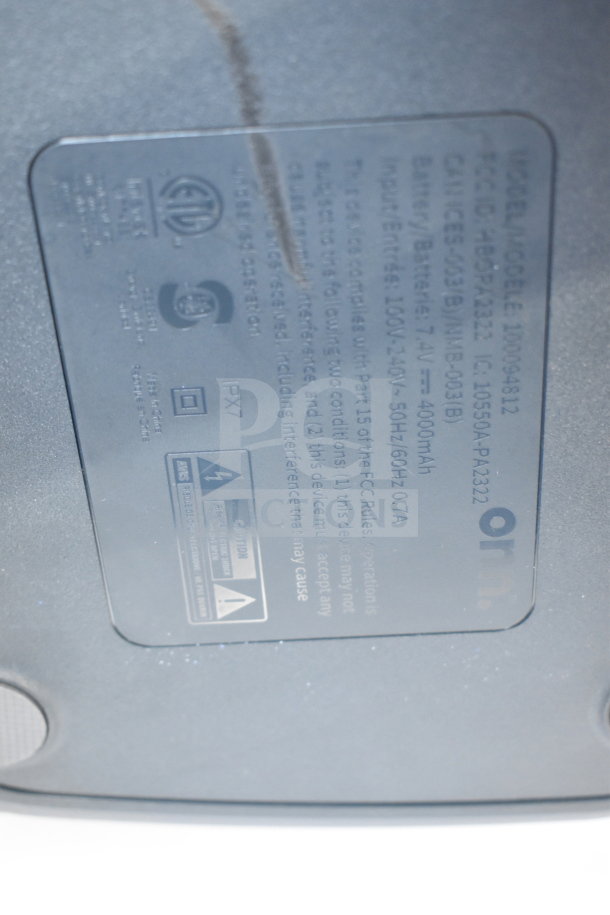 Onn Medium Party Speaker label showing model 100094812, input 100V-240V, 7.4V, 4000mAh battery, and IPX7 rating.
