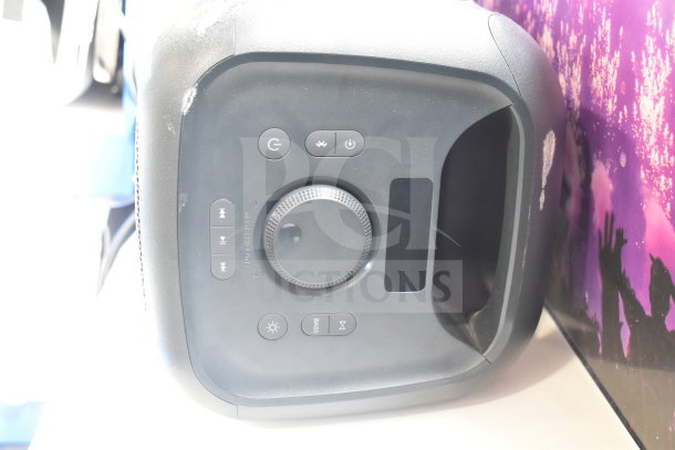 Onn Medium Party Speaker, display model, shown with control panel and buttons for power, volume, and lighting.