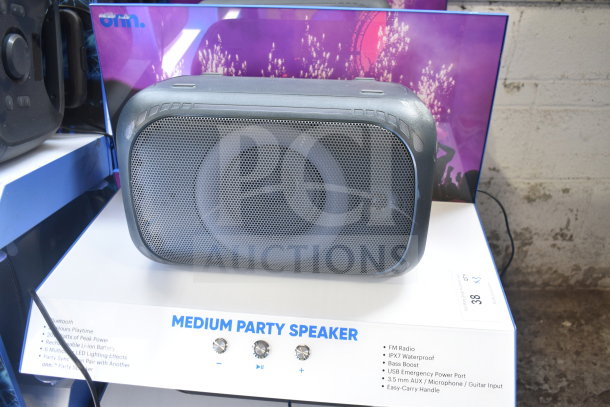Onn Medium Party Speaker, display model. Features include Bluetooth, IPX7 waterproof, FM radio, bass boost.