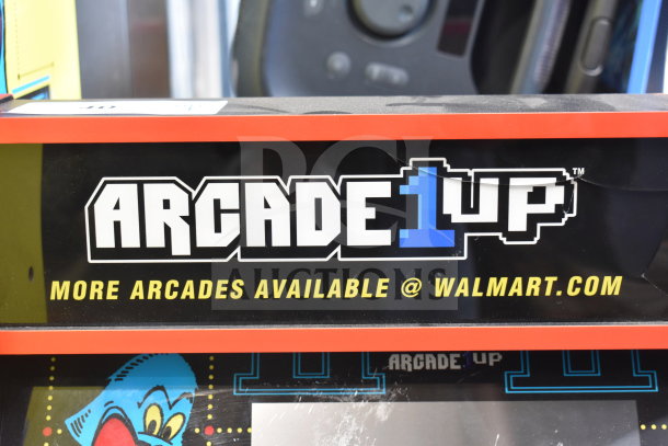 Arcade 1UP PAC-A-501030 Pac Man machine with logo and promotional text. Good condition.