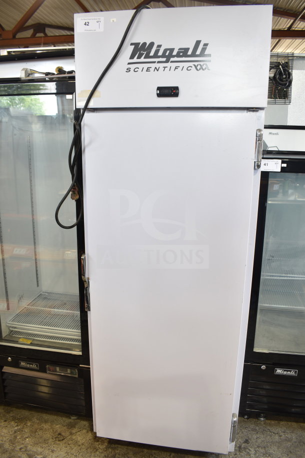Migali EVOx-1F commercial freezer, single door, scratch and dent, 115V, 1-phase, on casters. Visible Migali logo.
