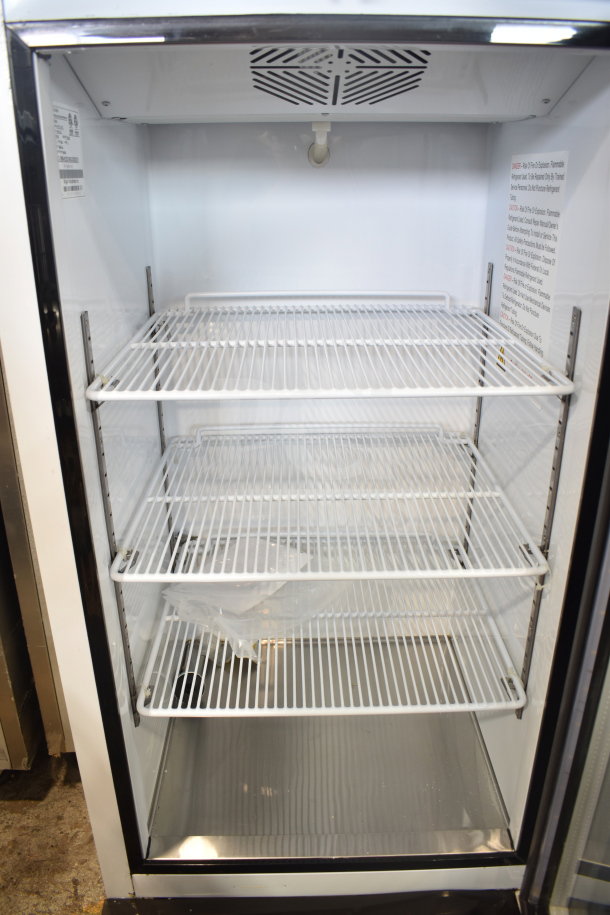 Migali C-10RM-HC cooler, single door, commercial casters, new scratch/dent, 115V, 1 phase, 2018 model, shelves visible.