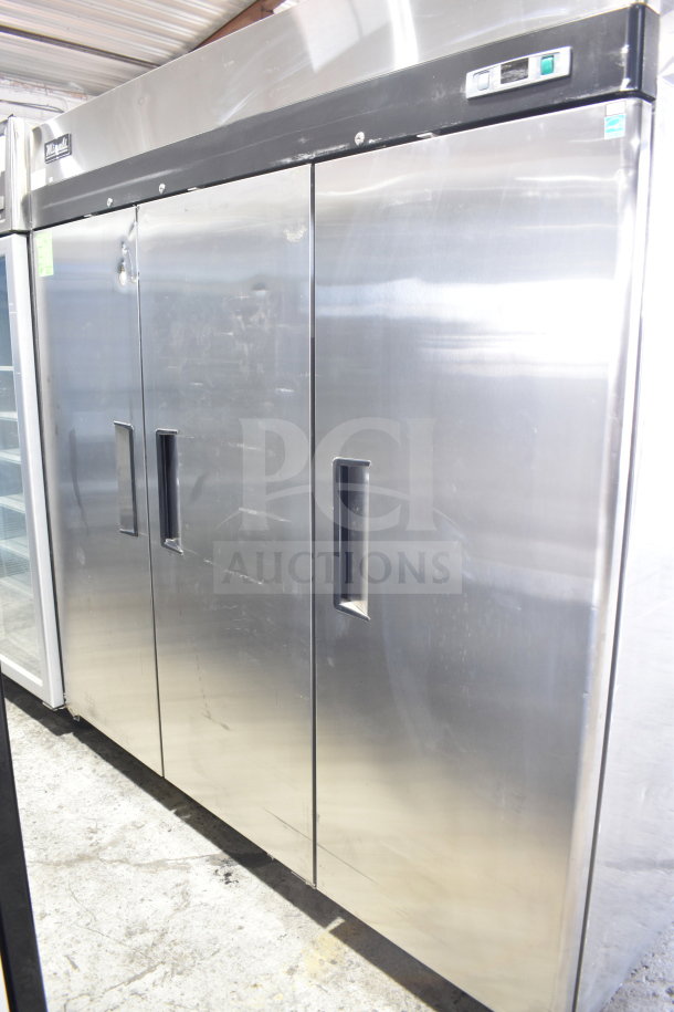 Brand new Migali C-3R-HC commercial 3-door reach-in cooler on casters. Stainless steel, minor scratches, 115V, 1 phase.