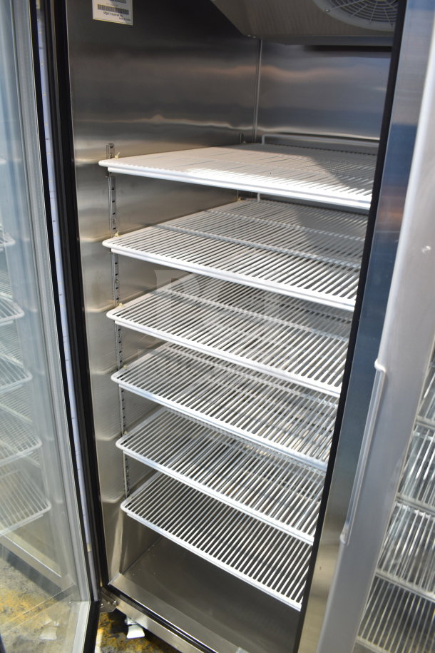 Migali LL-2RG commercial 2-door cooler, new with minor scratches. Six wire shelves, stainless interior, on casters. 115V, 1 phase.