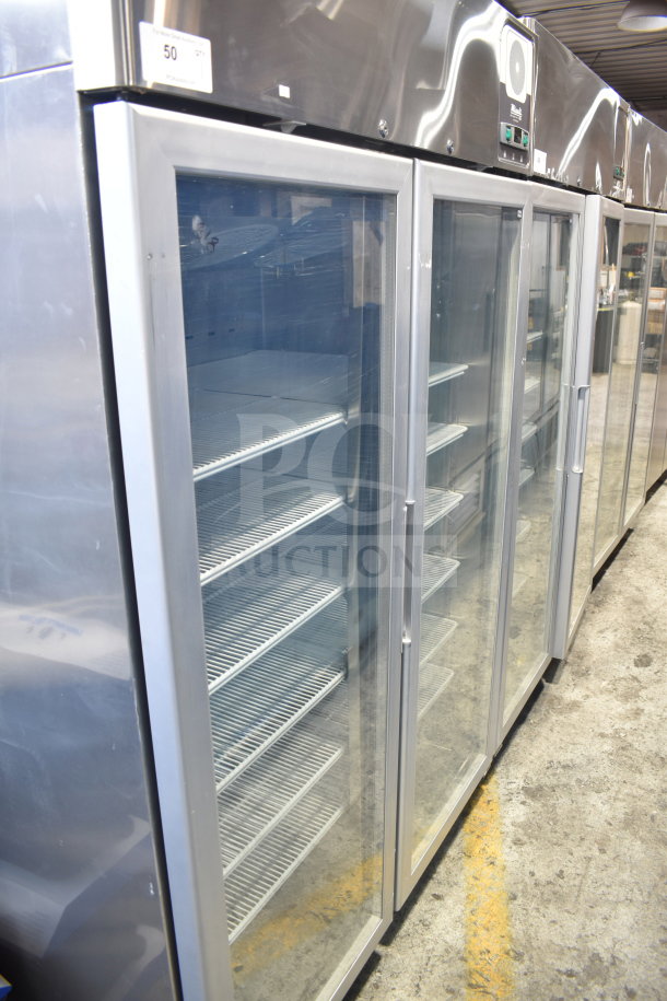 Brand new Migali G-2RG-HC commercial 2-door cooler with glass doors, adjustable shelves, and on casters; 115V, 1 Phase.