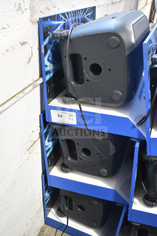 3 Onn large party speakers in store display; black, wheeled bases, tags show "54 QTY x3", good condition.