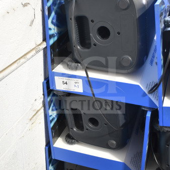 3 Onn large party speakers in store display; black, wheeled bases, tags show "54 QTY x3", good condition.