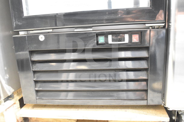 Migali C-12RG commercial cooler, black control panel with switches and vent. 115V, 1 phase. Brand new with minor scratches.