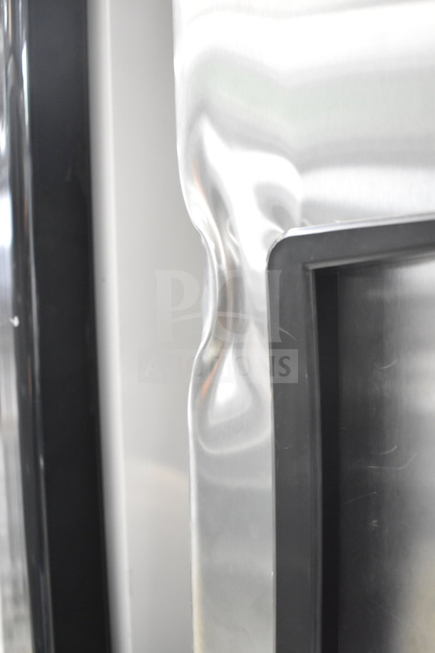 Migali C-1FB-HC freezer, 115V, scratch and dent visible on stainless steel door.