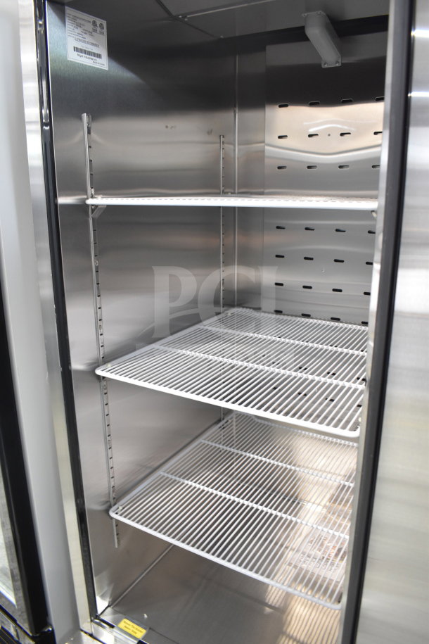 Brand new 2019 Migali C-1FB-HC commercial reach-in freezer, single door, 115V, scratch and dent condition, shelves inside.