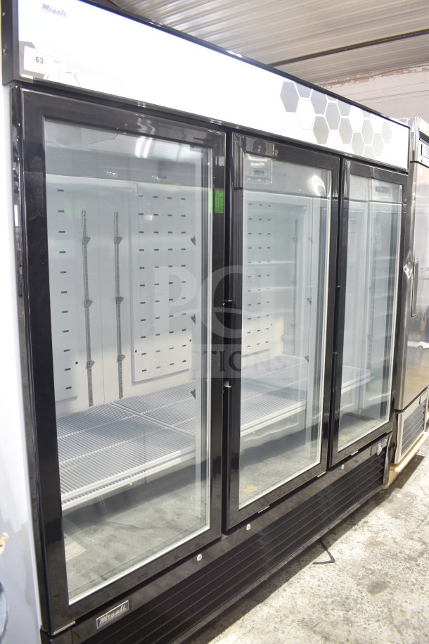 Brand new 2023 Migali C-72FM-HC 3-door reach-in freezer merchandiser on casters. Scratch and dent. 115V, 1 phase.
