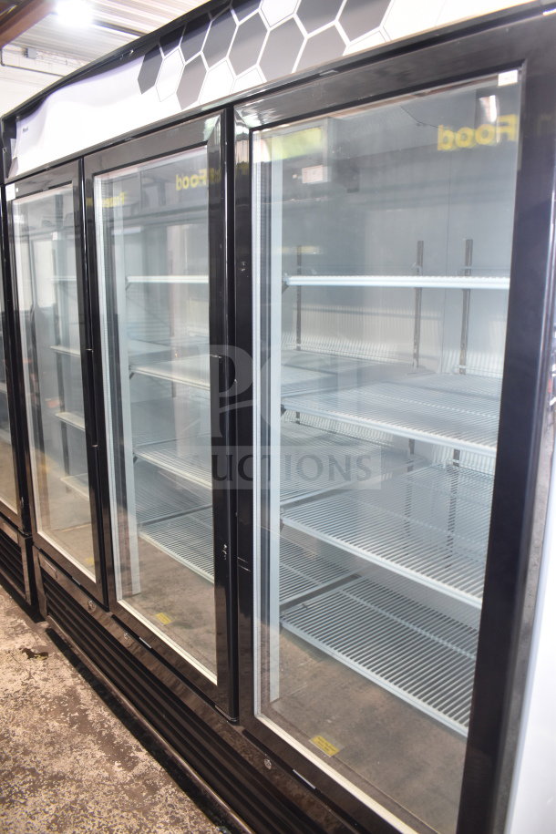 Brand new 2019 Migali C-72FM 3-door freezer merchandiser, scratch and dent, on casters, 115V, 1 phase, for commercial use.