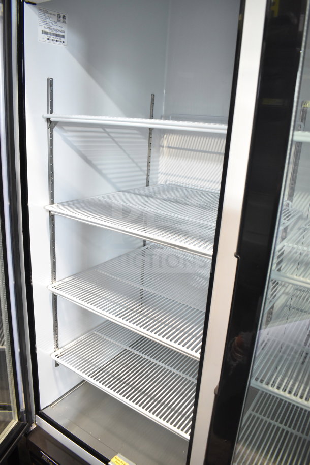Brand new 2019 Migali C-72FM 3-door freezer merchandiser, commercial casters, 115V, 1 phase, scratch and dent condition.