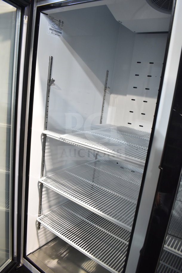 Brand new 2022 Migali C-49FM-HCe 3-door reach-in freezer, commercial casters, 115V, serial C-49FM-HCe003220921092C0016.