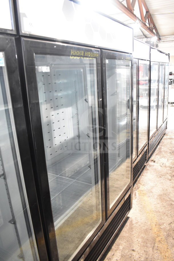 BRAND NEW Migali C-49FM-HCe 2021 commercial 3-door reach-in freezer merchandiser. Scratch and dent, on commercial casters.
