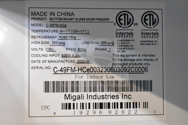 "2023 Migali C-49FM-HCe freezer label, showing model, voltage, refrigerant, temperature range, and serial number."
