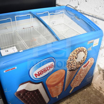 AHT Commercial Chest Freezer Merchandiser, 115 Volts, 1 Phase, blue casing with Nestlé branding, sliding glass lid.
