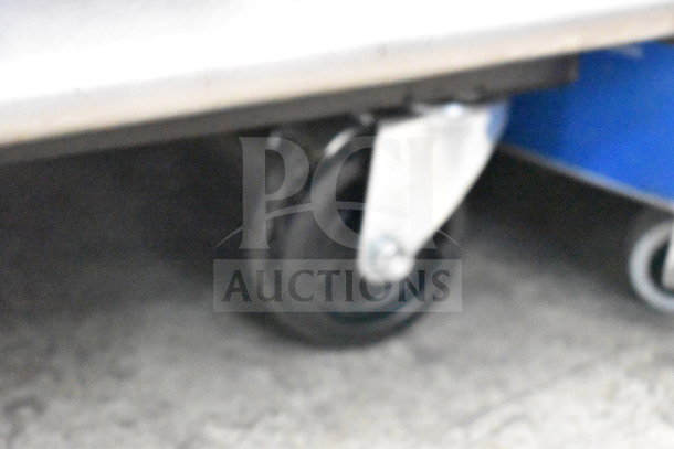 2019 True T-23F-HC freezer on commercial caster wheel, showing smooth mobility.