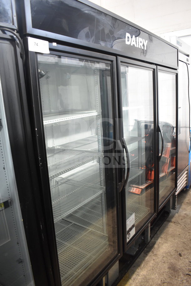 2019 True GDM-72-HC commercial 3-door reach-in cooler merchandiser, 115 volts, 1 phase, tested and working, labeled "Dairy."