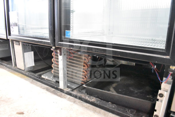 2019 True GDM-72-HC Commercial 3 Door Cooler, 115V, 1 Phase. Interior and piping visible, tested and working condition.
