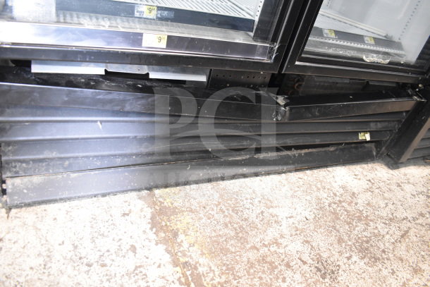 2018 True GDM-49F-HC Commercial 2 Door Freezer. Black exterior, tested, working, visible wear. 115/208-230V, 1 Phase.
