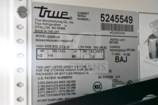 True GDM-49 cooler label showing voltage, phase, and refrigerant details. Tested and working commercial 2-door merchandiser.