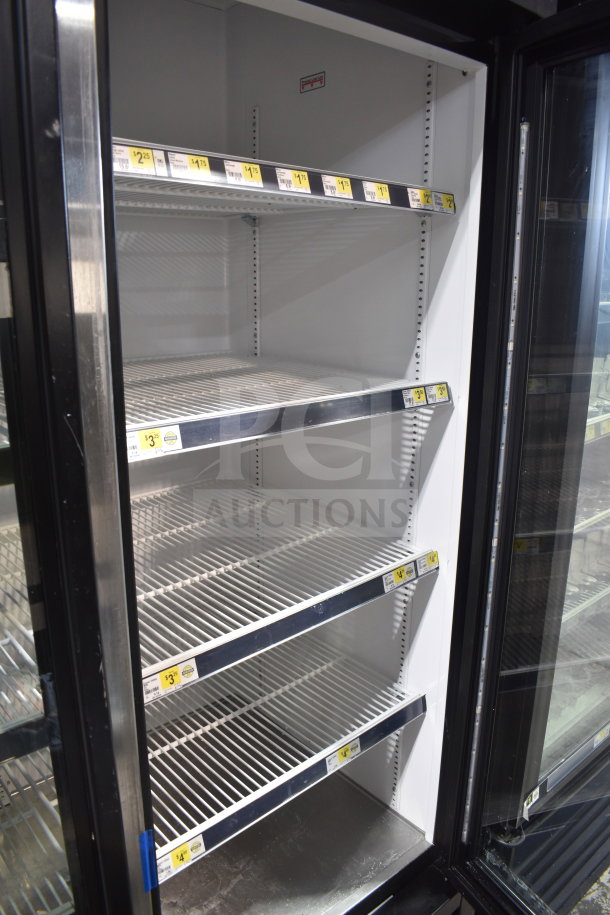 2018 True GDM-72-HC 3 Door Cooler Merchandiser, 115V, tested and working, features adjustable shelves, clean interior.