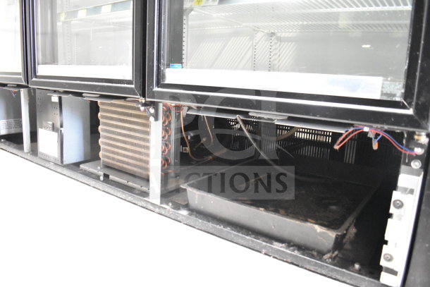 2018 True GDM-72-HC commercial cooler, 3-door, shelves visible, 115V, 1 phase, tested, working, internal components shown.